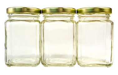 Three empty glass jars with gold caps. Isolated.