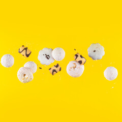 conceptual photo, flying cookies on a yellow background.copy space. levitation