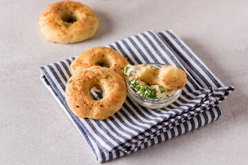 Tasty Homemade Cottage Cheese Donuts with spices gray background