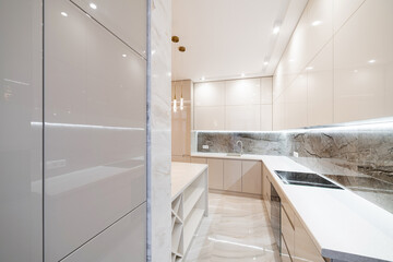 kitchen interior design in light colors and white countertop