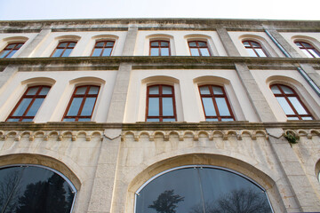 Fototapeta na wymiar Side Up Angle Architectural View of Old Istanbul Bayezid Library. Restorationed building of Ottoman style building. Fatih, İstanbul, Turkey. 