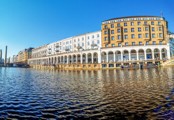 Hamburg Alster Arkaden view with a river in between which make it look like little Venezia