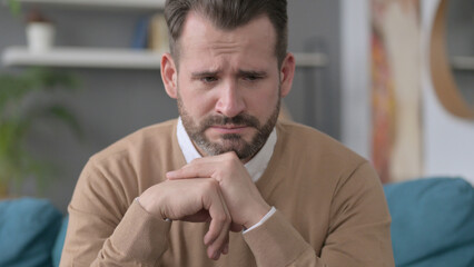 Portrait of Man Feeling Worried at Home