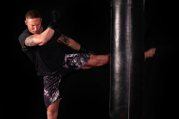 Fototapeta na wymiar MMA Boxer training. gym training