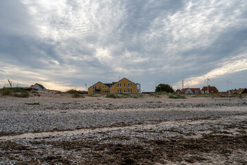 Fototapeta na wymiar A beautiful dark winter sky over a beach. Picture from Gilleleje, Denmark