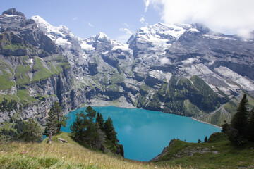 Oeschinenesee in Switzerland with the mountains BlÃ¼emlisalphorn and Doldenhorn in the background