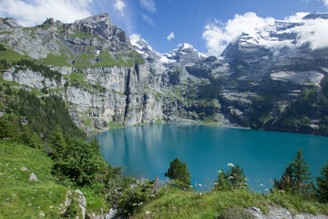 Oeschinenesee with the swiss mountains BlÃ¼emlisalphorn and Doldenhorn in the background
