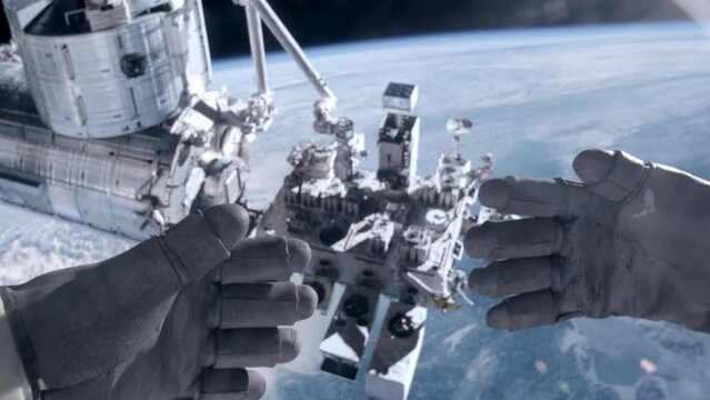 POV First person view of Earth and International Space Station through the astronaut helmet during the spacewalk. Some elements of the footage furnished by NASA