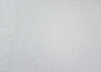 Water droplets on the white wall