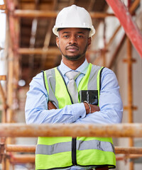 Coming together is a beginning keeping together is progress. Shot of a young man working on a...