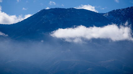 Mountain with a blanket of clouds