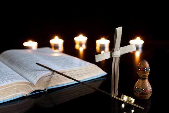 gold incense and myrrh with cross and bible witrh candles