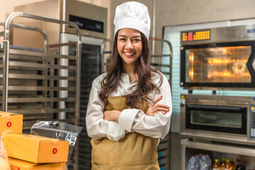 Young Asian and African American  chef startup partners, small business blogger live mobile application technology, bakery sales online promotion. at kitchen.Chef looking at the phone camera.