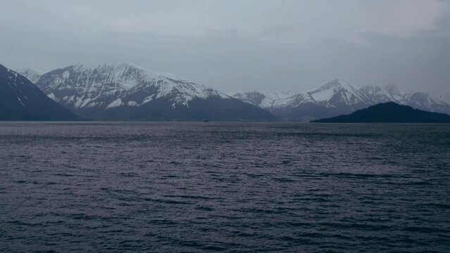 On board a car ferry, Norway, with mountains