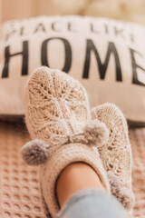 Handmade knitted socks on the legs