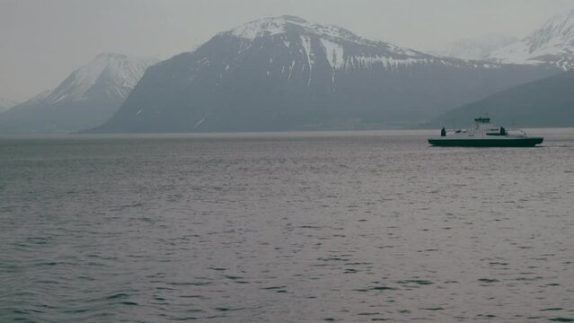 On board a car ferry, Norway, with another passing