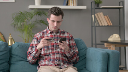 Man making Online Payment on Smartphone