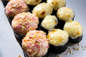 Hot sushi. Hot rolls. Japanese kitchen. Asian cuisine. Sushi.