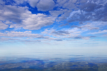 Plakat The sky with clouds over the sea surface in the morning creates a seascape of fantastic beauty.