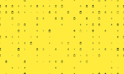 Seamless background pattern of evenly spaced black gas symbols of different sizes and opacity. Vector illustration on yellow background with stars