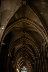 Fototapeta premium Rib Vault ceilings with stained glass windows inside Saint-Severin Church