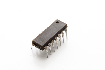 old electronic microcircuit on white background.