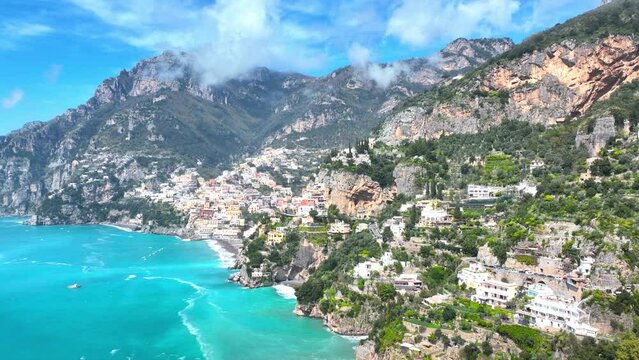 Amalfi coast in Italy, aerial view of famous holiday destination in Italy, mediterranean village of Positano, resort with idyllic turquoise sea, tourism in Italy 