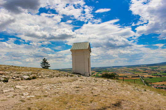 A part of the Way of the Cross on Holy Hill. Svaty kopecek. Moravia historic landmark. Summer time under wonderful sky.