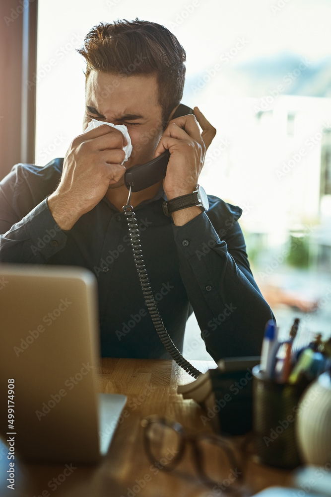 Poster it might be time to schedule that appointment with the doctor. shot of a young businessman blowing h