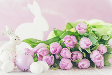 Bunch of fresh pink tulips with Easter decorations