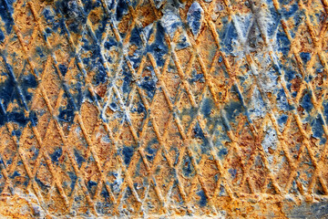 rusty iron sheet background with paint residue close up