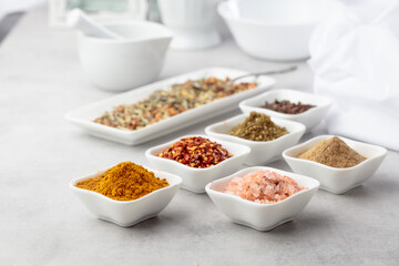 Various spices on a kitchen table.