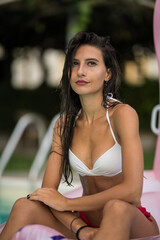girl in bikini at pool