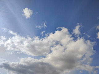 Fluffy cloud texture from a perfect cloudy blue sky