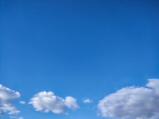 Fluffy cloud texture from a perfect cloudy blue sky