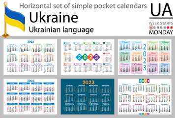 Ukrainian horizontal pocket calendar for 2023. Week starts Sunday