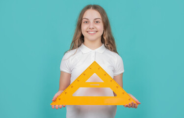 cheerful child with math triangle measuring tool