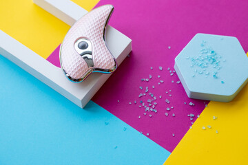 beauty serum and microcurrent toning device on color background. skin care, anti age and lifting procedures. top view.Ultrasonic Skin Scrubber.face massager, home skin care, led beauty