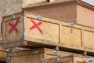 large wooden boxes stacked for transportation artworks and exhibitions material
