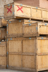 large wooden boxes stacked for transportation artworks and exhibitions material