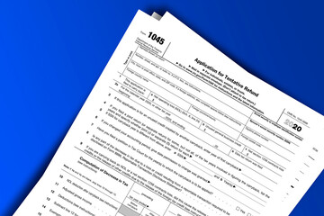 Obraz premium Form 1045 documentation published IRS USA 11.30.2020. American tax document on colored