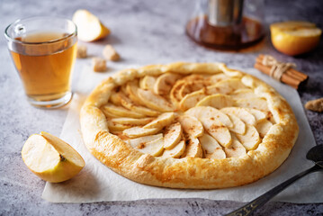 Apple galette on a paper sheet