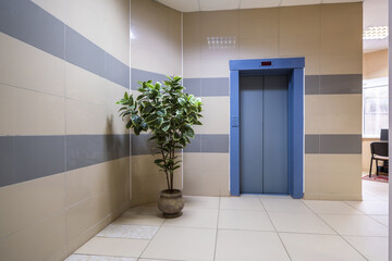 staircase hall in an apartment building  at the entrance to the elevator © hiv360
