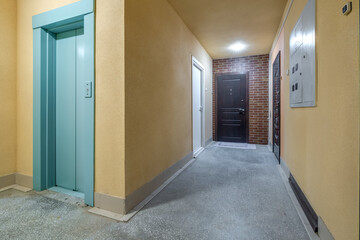 staircase hall in an apartment building  at the entrance to the elevator