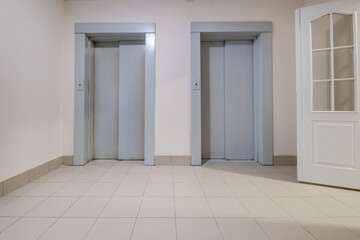 staircase hall in an apartment building  at the entrance to the elevator © hiv360