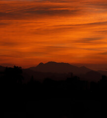Sunset and mountains. Orange sunset. Landscape sunset, sunrise