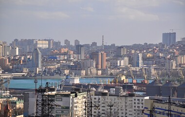 View of the city from the height of the mountains. Novorossiysk. Russia. Krasnodar Territory. The largest port in Russia, including passenger, cargo ports and an oil harbor. Important transport hub.