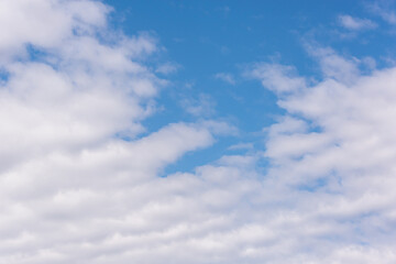 Light blue sky and clouds.