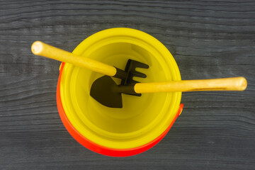Garden tool in a bucket.