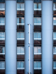 Fototapeta na wymiar Generic facade of an apartment building with many windows